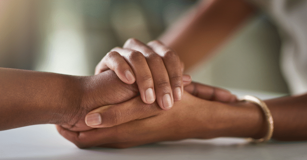 Close-up of supportive hands