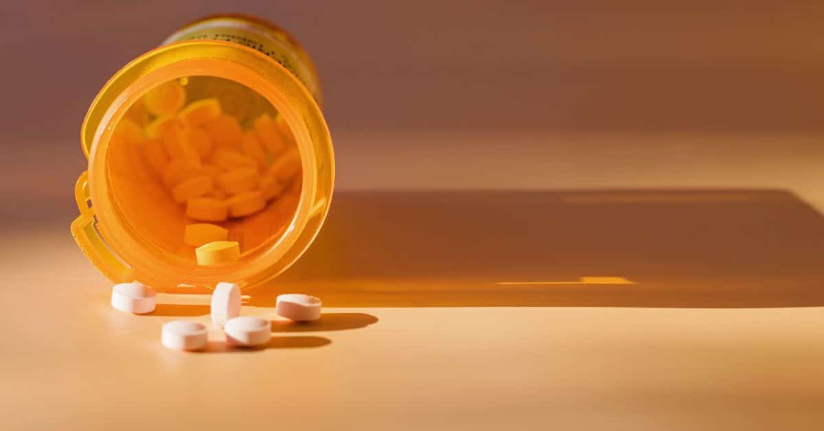 Spilled pill bottle with tablets
