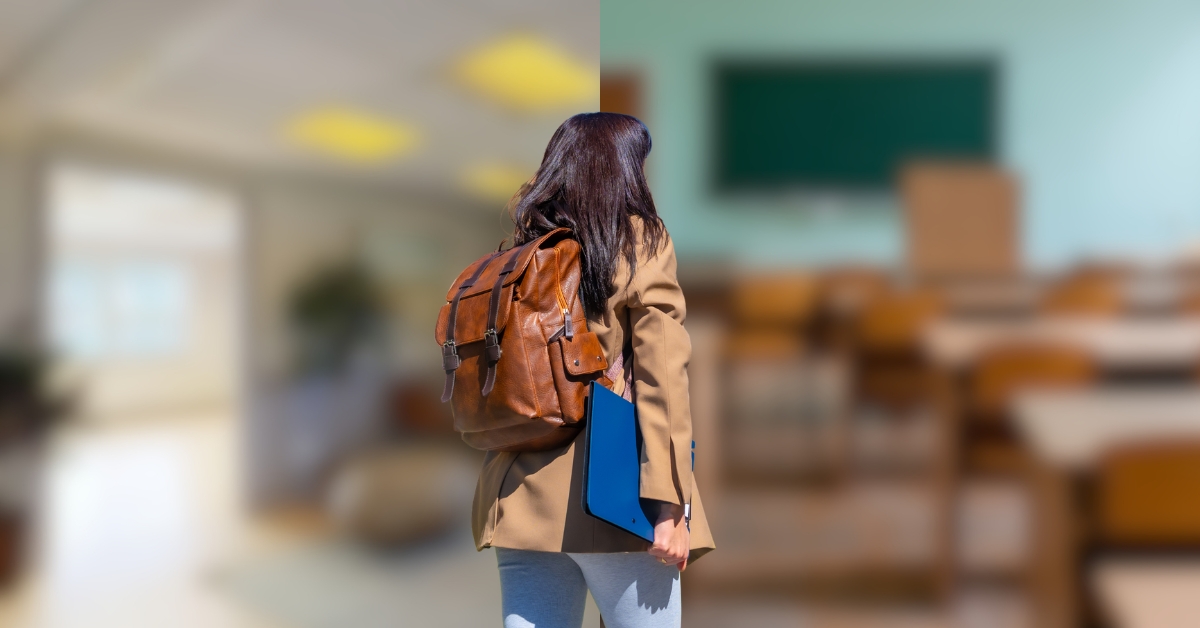 Student walking with backpack in school hallway
