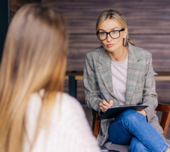Mental Health Treatment 5 Therapist talking to client